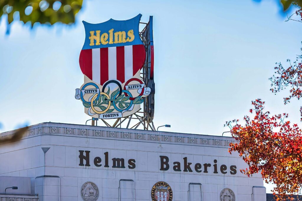 Iconic Helms Bakery building in Culver City CA with vintage Olympic-themed rooftop sign