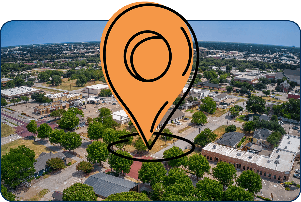 Large location pin icon over aerial view of downtown Allen TX with local shops, trees, and streets on a sunny day