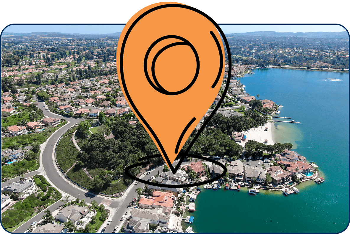 Aerial view of Lake Mission Viejo CA with waterfront homes, beaches, and large orange location pin icon