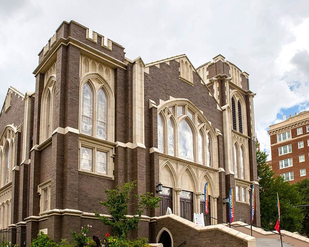 Historic Methodist Episcopal Church building in Oak Lawn Dallas with gothic-style windows