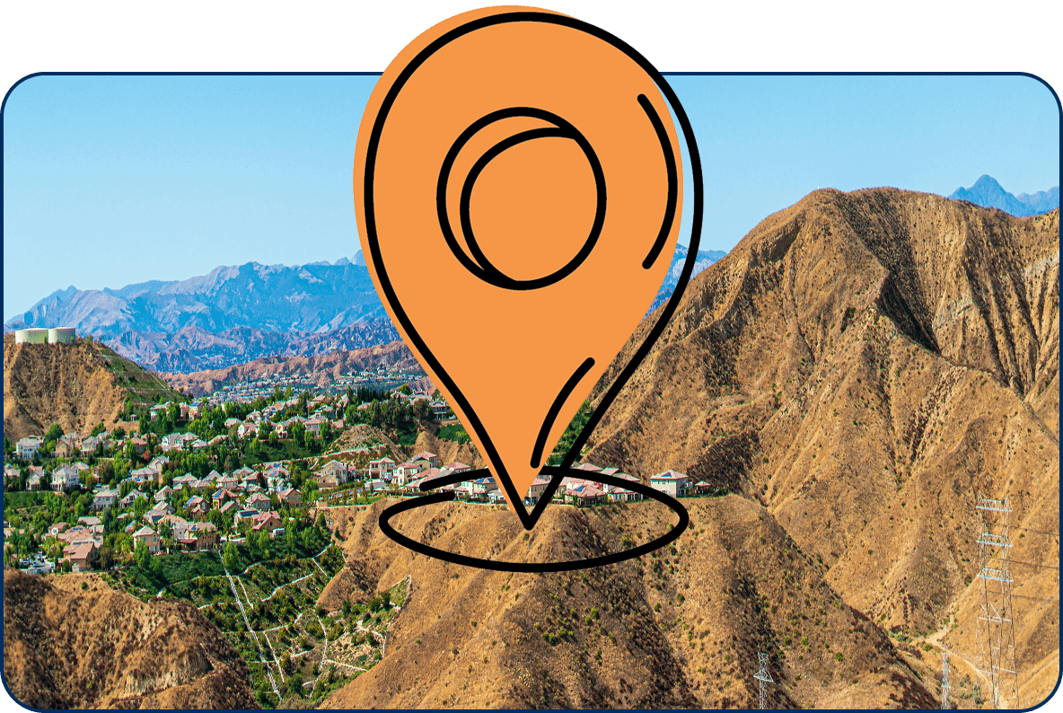 Large location pin icon over Santa Clarita CA aerial view of homes, hills, and mountains