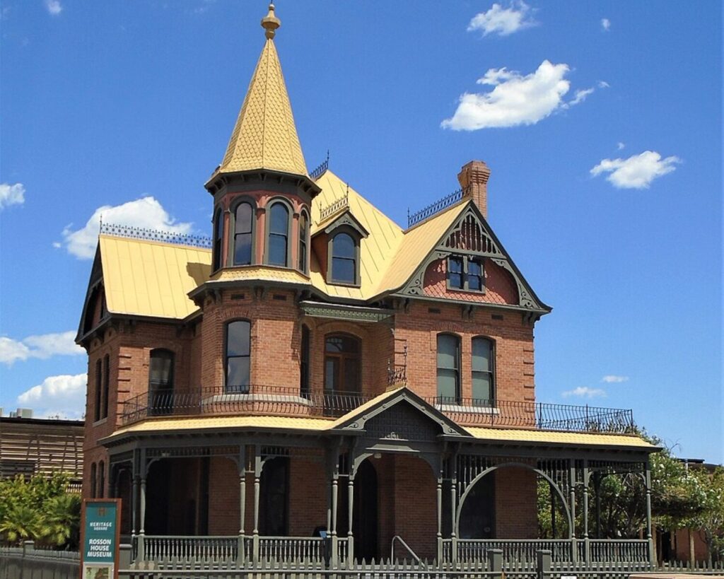 Victorian-style Rosson House Museum in Heritage Square, Phoenix, Arizona, featuring a red brick exterior, ornate details, and a gold-colored roof tower