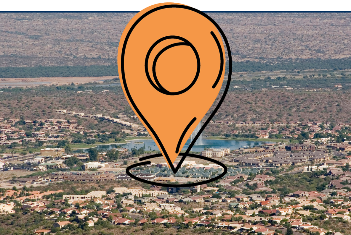 Aerial view of Fountain Park with tall water fountain and residential area in Fountain Hills, Arizona