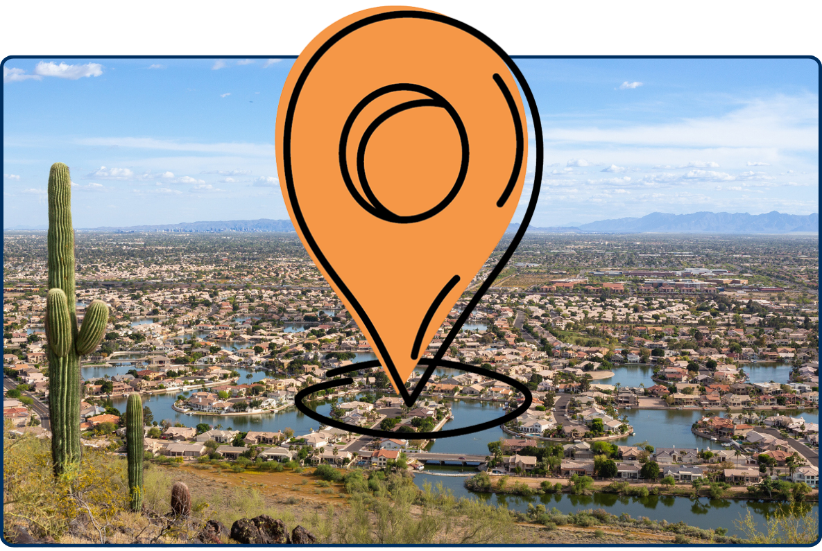 Aerial view of Glendale Arizona with desert homes, lakes, saguaro cactus and distant mountain ranges