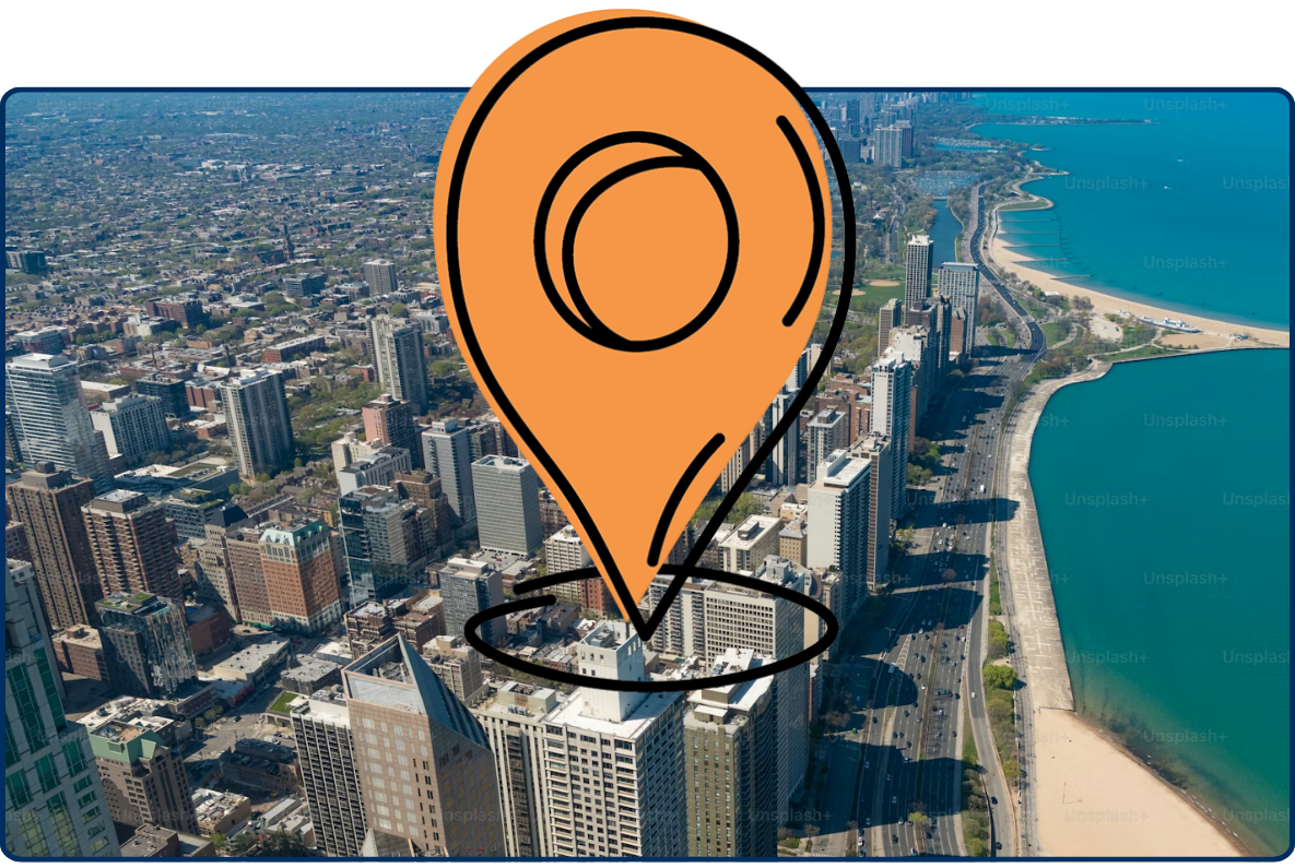 Aerial view of Chicago city skyline with high-rise buildings along Lake Michigan coastline and sandy beach urban landscape