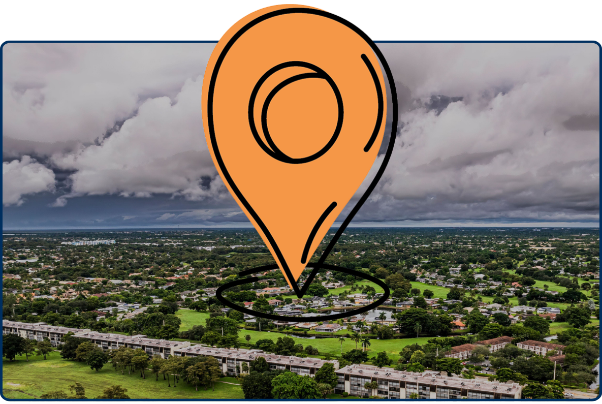 Aerial view of suburban landscape in Lauderhill Florida with lush greenery lake residential buildings and cloudy sky