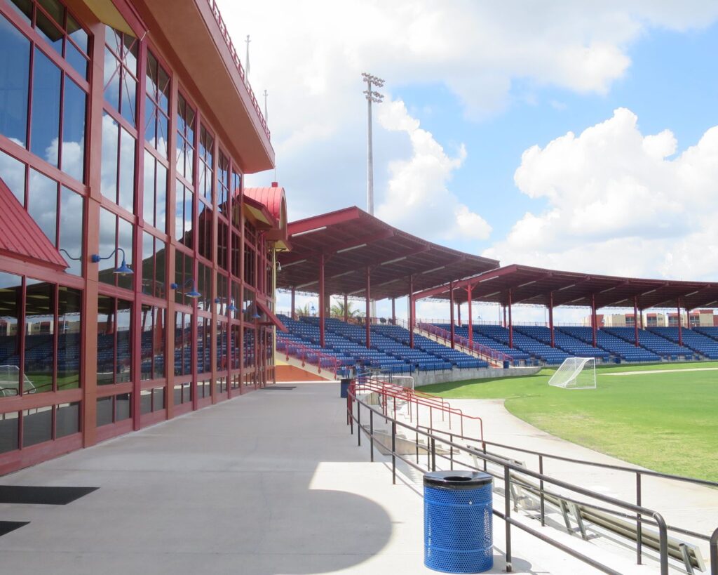 Central Broward Regional Park cricket stadium Lauderhill Florida with seating stands green field and modern structure