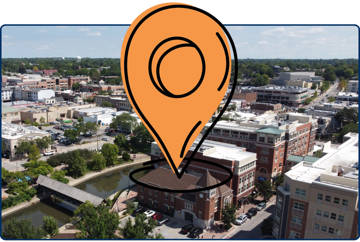 Downtown Naperville Illinois aerial view with riverwalk buildings bridges and cityscape during daytime