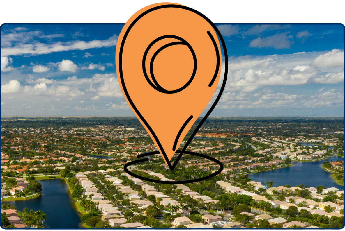 Aerial view of Pembroke Pines Florida residential neighborhood with houses lake canals greenery and blue sky