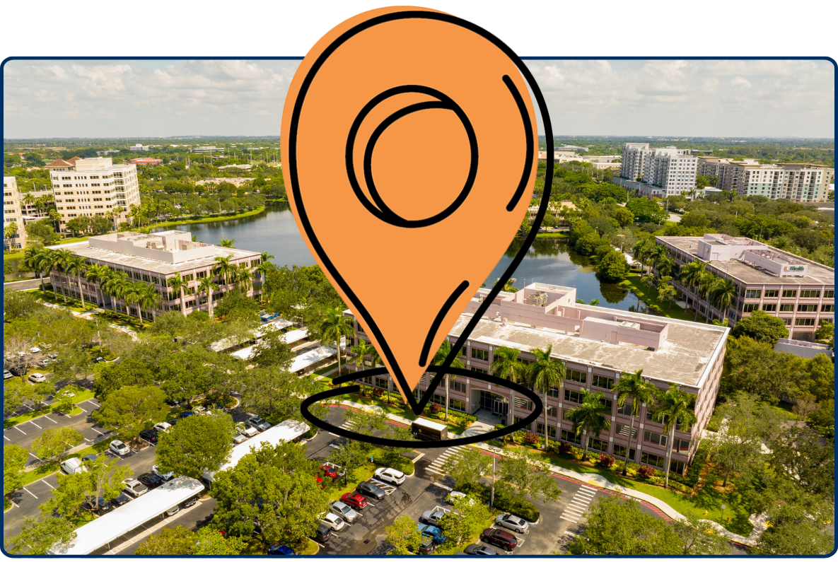 Aerial view of office buildings in Plantation Florida USA with lake greenery parking area and cloudy sky