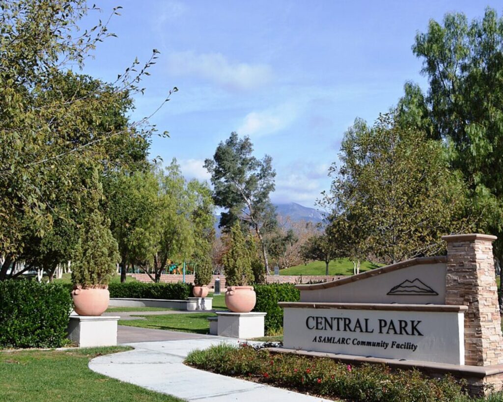 Central Park entrance with landscaped pathway and greenery in Rancho Santa Margarita, California