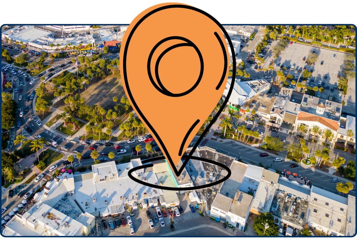 Aerial view St Armands Circle Sarasota Florida coastal city roundabout with ocean waterfront roads buildings urban landscape USA