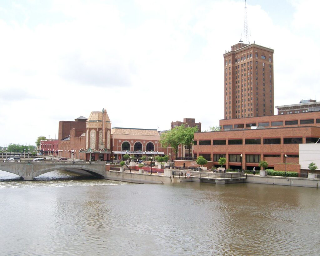 North Riverside Illinois Commons building with green lawn modern architecture and trees during sunny day
