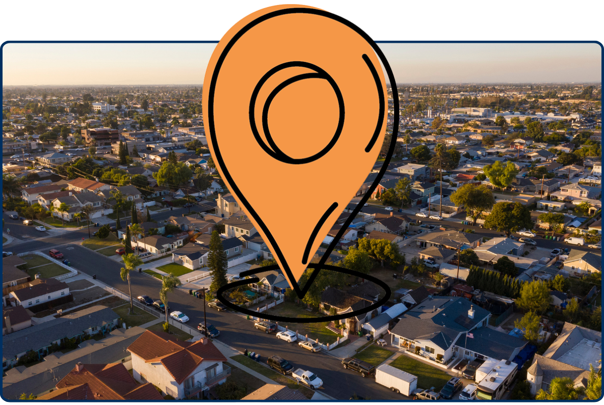 Aerial view of Westminster California residential neighborhood with houses streets and suburban layout during golden hour