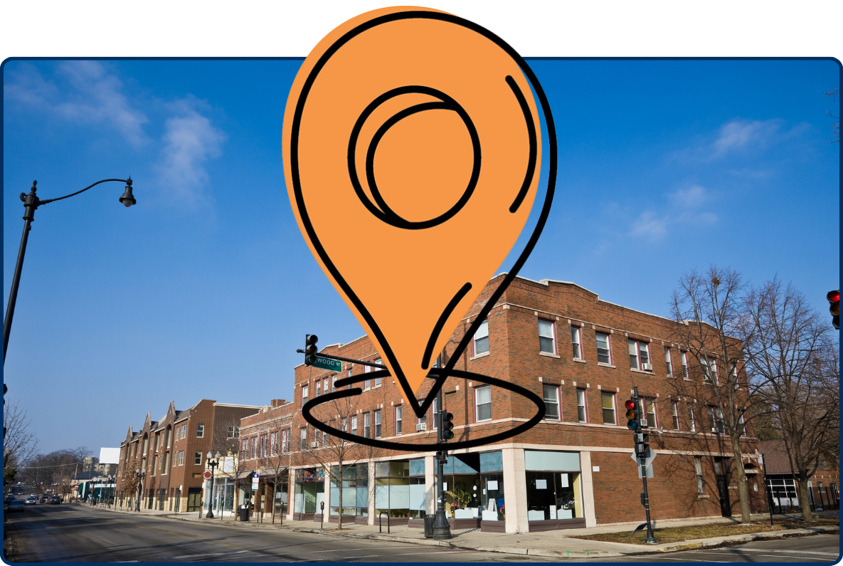 Downtown Beverly, Chicago street intersection lined with historic brick buildings under a clear blue sky.