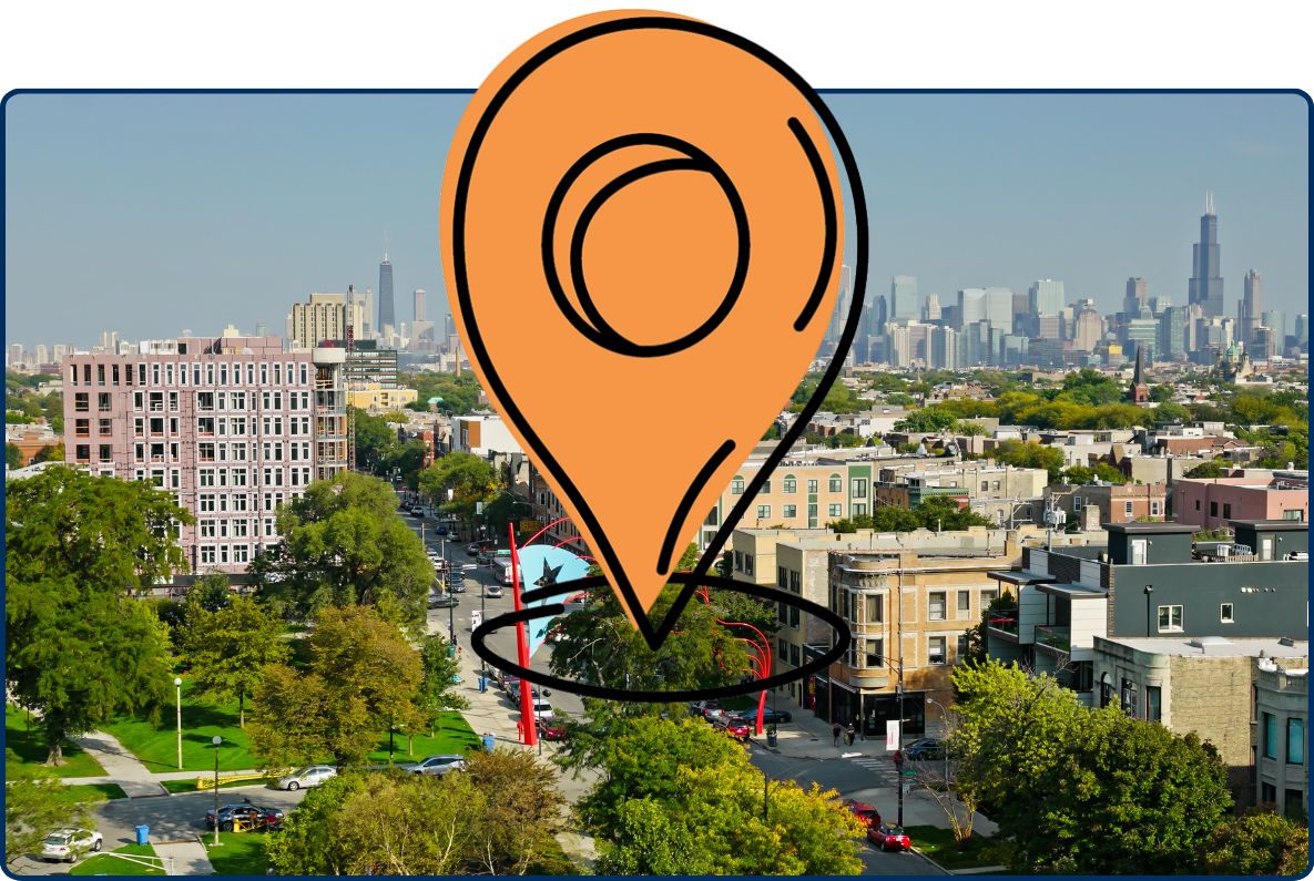 Aerial view of Humboldt Park and surrounding Chicago neighborhoods, with the downtown skyline visible in the distance.