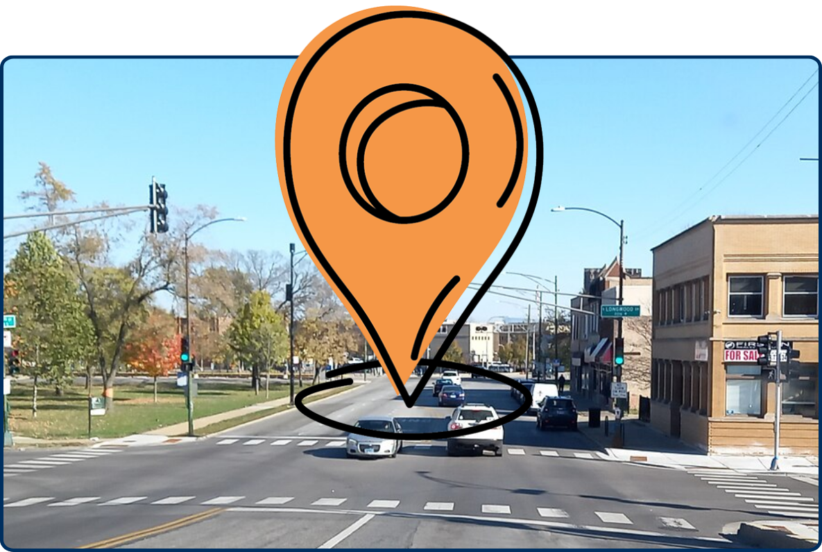 Intersection of 111th Street and Longwood Drive in Chicago’s Morgan Park, with traffic, crosswalks, a park, and low-rise buildings under a clear blue sky.