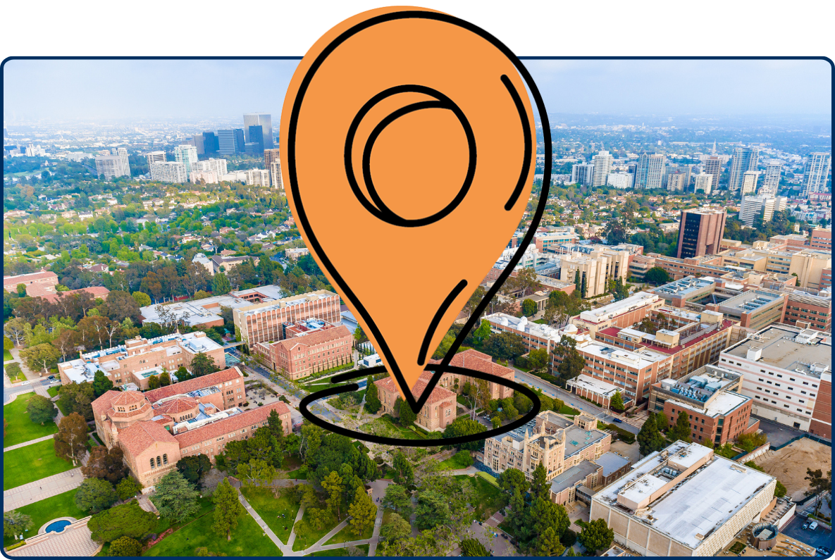 Aerial view of UCLA campus in Westwood with green spaces, university buildings, and Century City skyline in the distance.