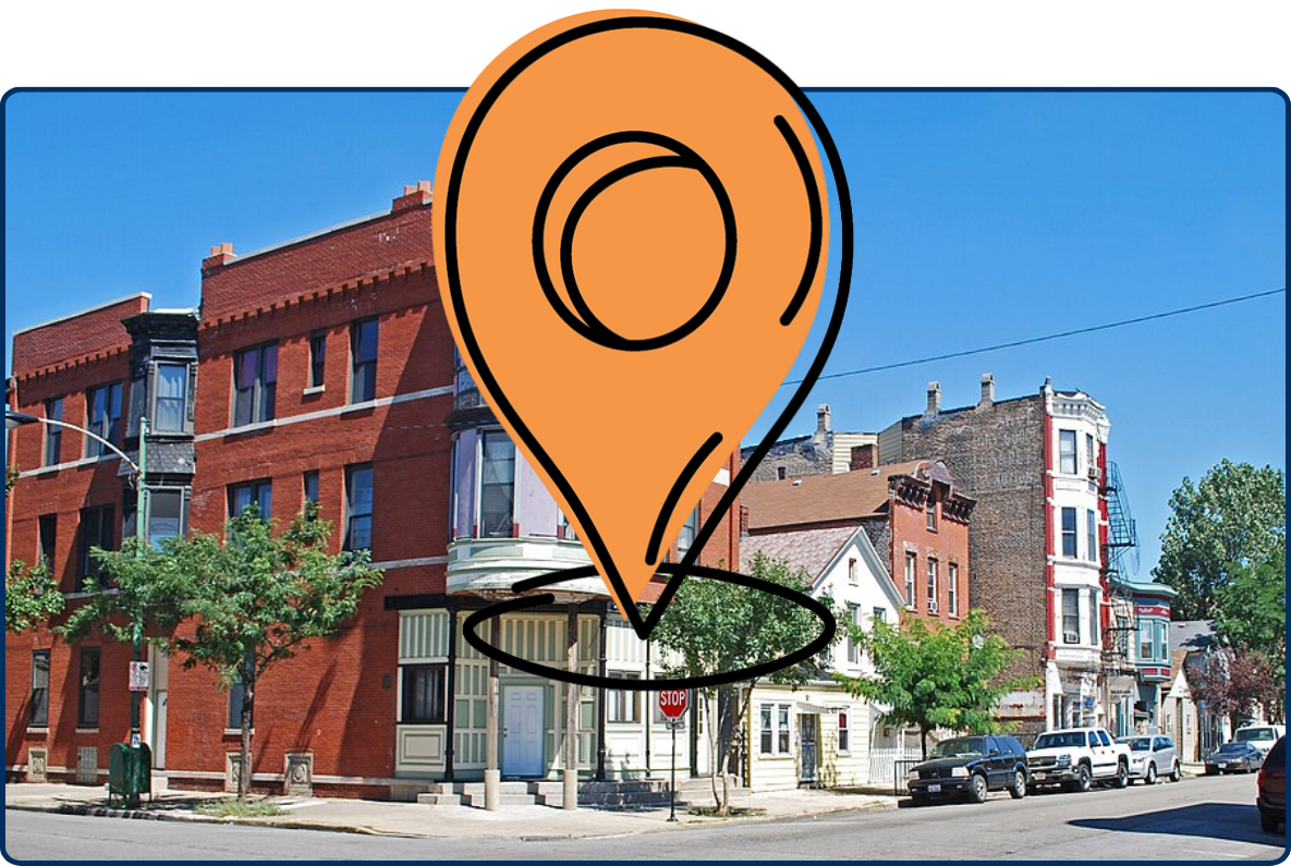 Historic red-brick buildings with ornate bay windows along a street in Chicago’s Pilsen Historic District.