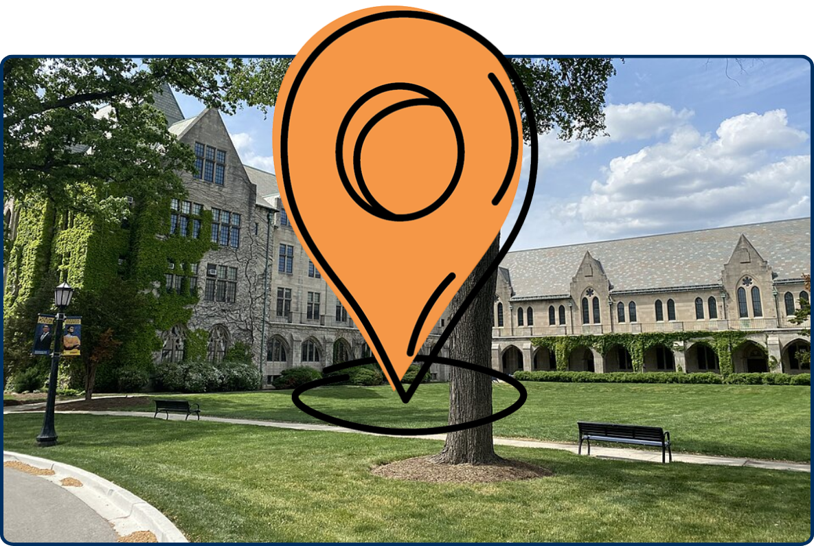 Gothic-style stone buildings at Dominican University surrounding a green lawn with a large tree.