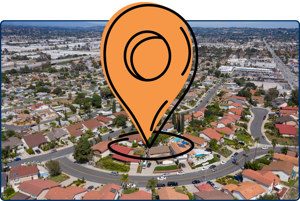Aerial view of Rowland Heights, California, showing residential neighborhoods, winding streets, commercial areas, and surrounding hills.