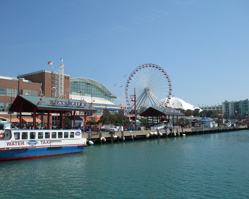 Chicago’s Navy Pier with a Ferris wheel and water taxi along the Lake Michigan waterfront.