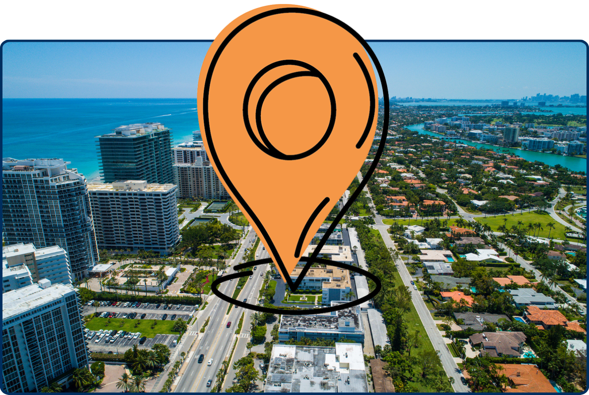 Aerial view of Collins Avenue in Bal Harbour, Florida, with beachfront high-rises, residential neighborhoods, waterways, and the Atlantic Ocean.
