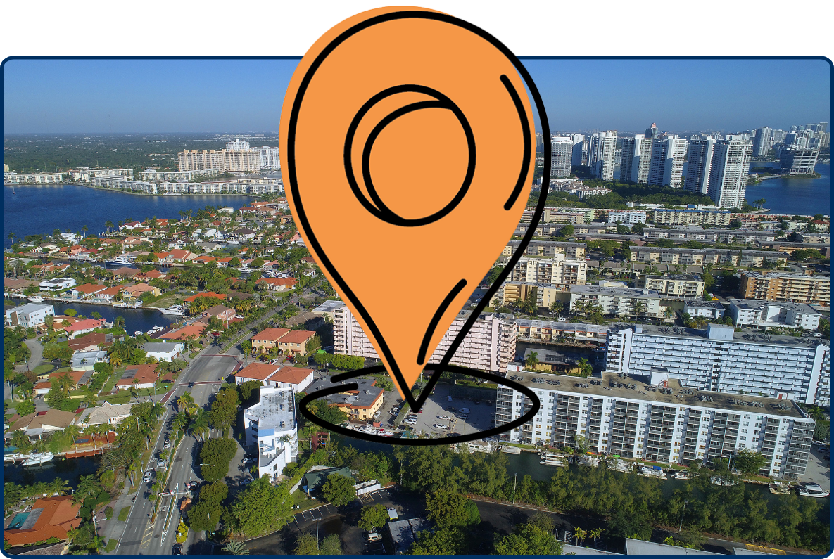 Aerial view of Eastern Shores in North Miami, Florida, showing waterfront homes, canals, apartment buildings, and clusters of high-rise towers.